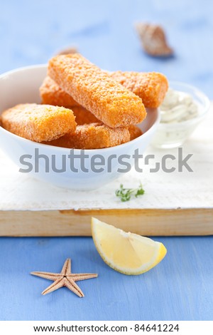 fresh frozen fish fingers with lemon