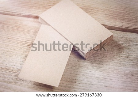 Identity Design, Kraft Paper Corporate Business Card on aged wooden background