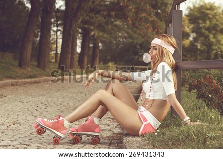 Sexy woman with roller skates