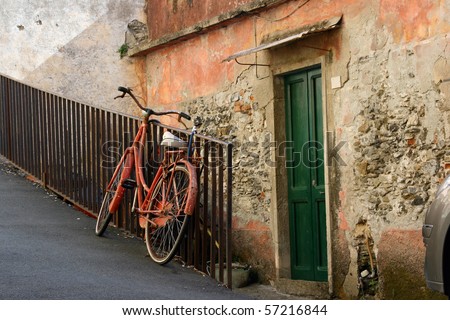 Vintage red bicycle in European village