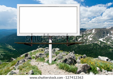 Blank billboard advertising sign in the Colorado mountains outdoors wilderness