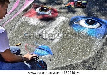 RALEIGH, NC, USA - SEPTEMBER 15: ArtSpark\'s street painting festival in Fayetteville street attracted a big crowd on September 15, 2012 in Raleigh, NC, USA
