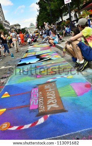 RALEIGH, NC, USA - SEPTEMBER 15: ArtSpark's street painting festival in Fayetteville street attracted a big crowd on September 15, 2012 in Raleigh, NC, USA