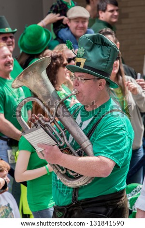 RALEIGH, NC, - MARCH 16: The city of Raleigh celebrating St. Patrick\'s day with the annual parade on March 16, 2013 in Raleigh inÃ?Â NC, USA