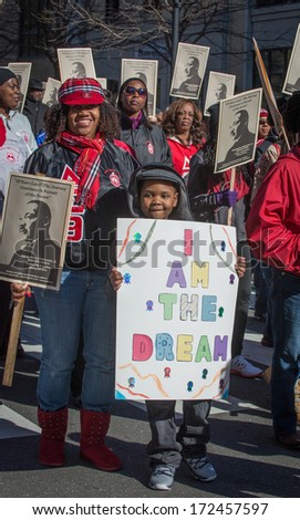 RALEIGH - JANUARY 20: People joined the 50th Martin Luther King Memorial March, on January 20, 2014 in Raleigh, USA. The 50th March in memory of Dr. Martin Luther King\'s birthday.