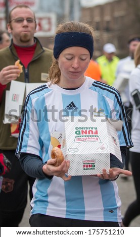 RALEIGH - FEBRUARY 8: The 10th Krispy Kreme Challenge has raised $200.000 for the Children\'s hospital, on February 8, 2014 in Raleigh, USA. The rules are run 2,5 miles, eat 12 donuts and run 2,5 miles