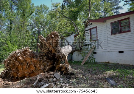 HOLLY SPRINGS, NC, USA - APRIL 17: The day after a tornado caused severe damage to homes in the town of Holly Springs on April 17, 2010 in Holly Springs, NC, USA