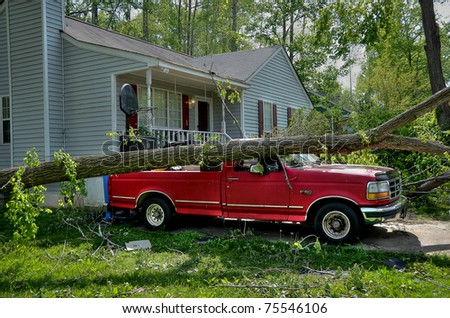 HOLLY SPRINGS, NC, USA - APRIL 18: A tornado caused severe damage to a car in the town of Holly Springs on April 16, 2010 in Holly Springs, NC, USA