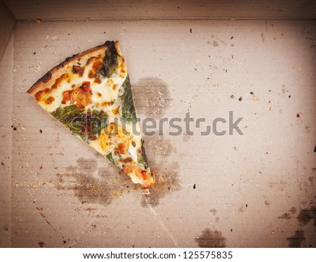 Pizza slice last one left in the pizza box