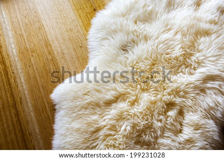 Lambs wool sheepskin on a timber floor