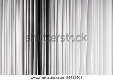 Abstract detail of thick paper pages in book
