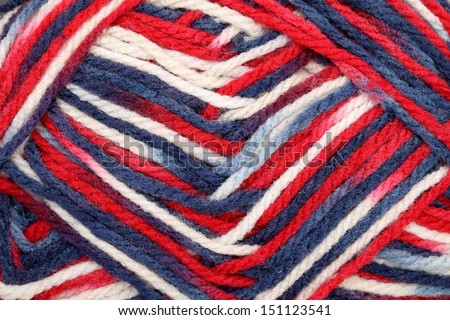 Detail of a ball of colorful yarn, texture background