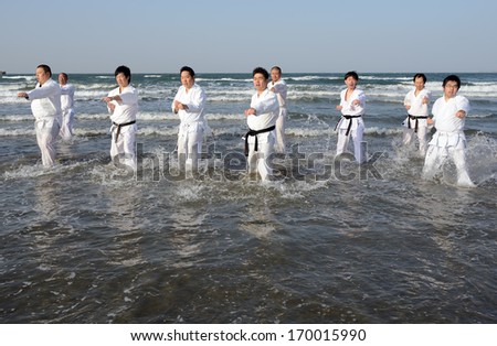 EHIME, JAPAN - Jan 2: Japanese martial art houses training of karate at the new year at Ichinomiya beach. January 2, 2014, Ehime, Japan