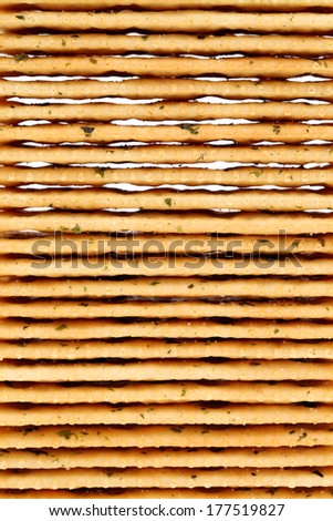 stack of vegetable salty crackers as background