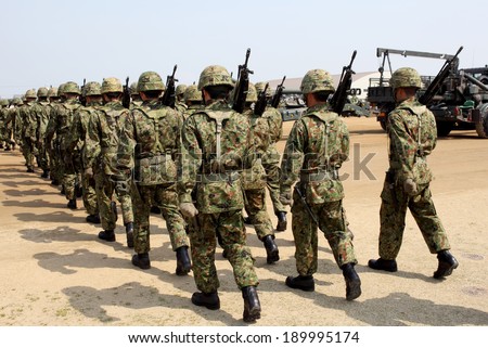 Japanese armed marching soldiers