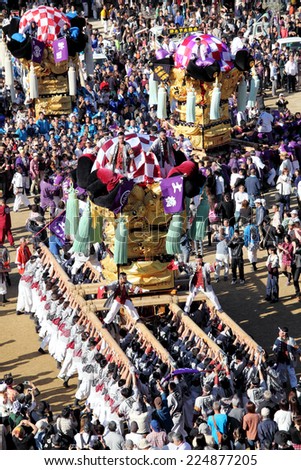 EHIME, JAPAN - OCTOBER 17: Golden large shrine festival on october 17, 2014 in Nihama, Ehime, Japan. This is the traditional event in autumn of Japan.