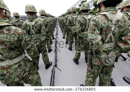 Japanese armed marching soldiers with weapon