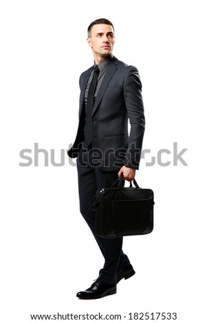 Full-length portrait of a thoughtful businessman with bag isolated on a white background