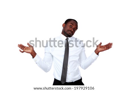 Portrait of a african man with a kind of uncomprehending opened his arms to the sides