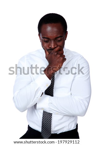 Portrait of a pensive african man isolated on white background