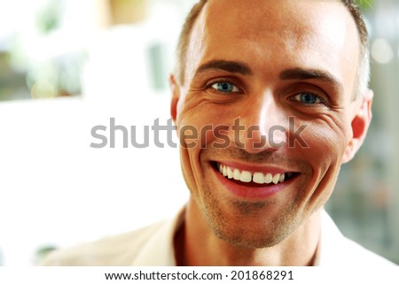 Closeup portrait of a handsome happy man