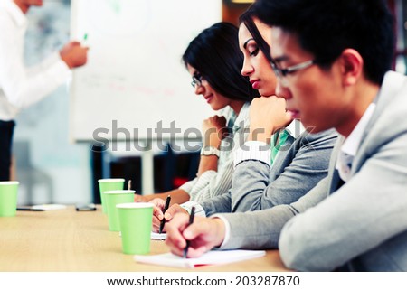 Business people sitting at the meeting in office