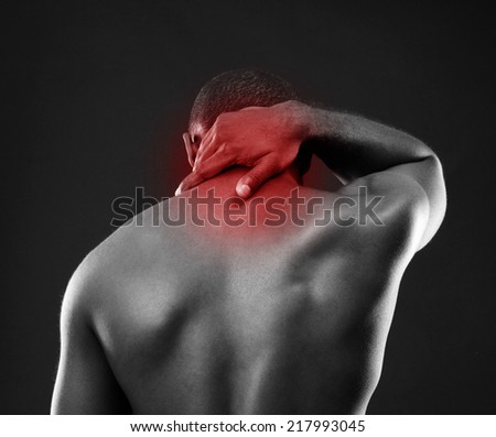 Back view portrait of african man over black background