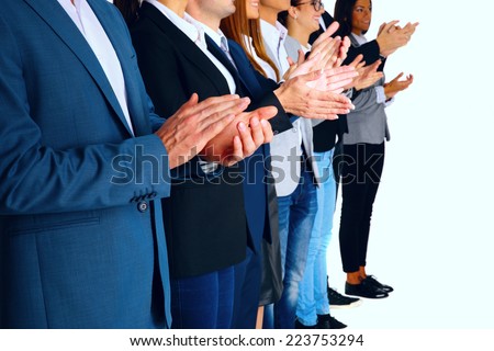 Group of business partners applauding