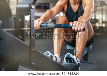 Cropped image of fitness man doing exercise. work hard