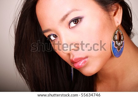 asian model makeup. stock photo : Closeup portrait of a young beautiful asian model with makeup