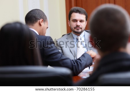 Mature businessman interviewing new people