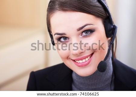 Beautiful call center operator with headset.