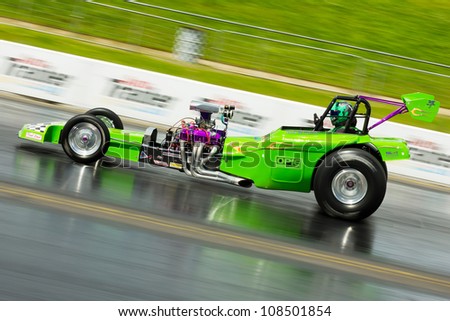 NORTHAMPTONSHIRE, UK - JULY 15 2012: Dave Williams drive his dragster \