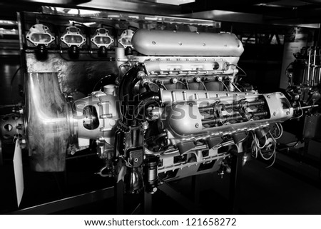 Large old antique engine in black & white