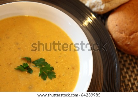 Hot Indian Chicken Soup in Bowl With Bread