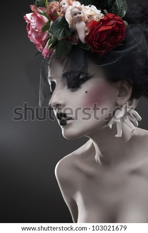 Dark beauty portrait of pale woman
