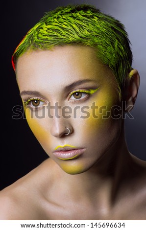 Creative makeup with green hair