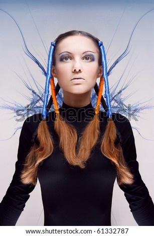 Futuristic girl with blue and orange energy flows. Art concept
