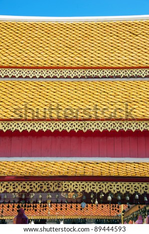 Orange and red roof tiles at the Doi Suthep Buddhist temple in Chiang Mai, Thailand.