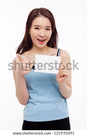 Asian woman showing empty card and thumb isolated on white background.