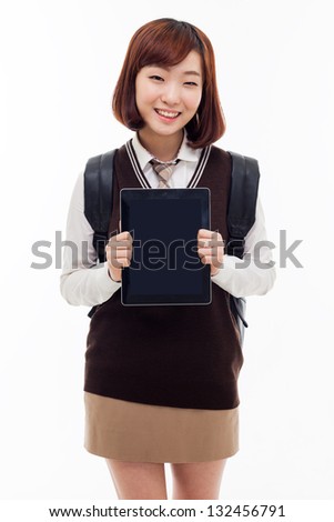 Yong pretty Asian student studying  with tablet PC isolated on white background.
