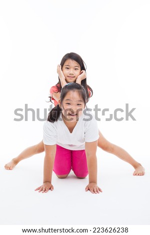 Asian two girls carry on isolated on white.