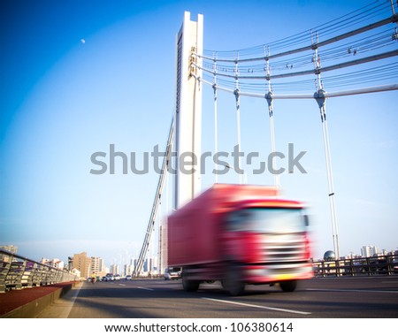 speeding truck go through the bridge