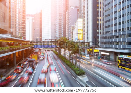 the light trails on the modern building background in Hong Kong china