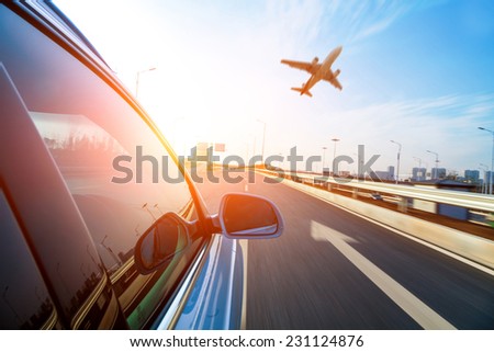 Car ride on road in sunny weather, motion blur