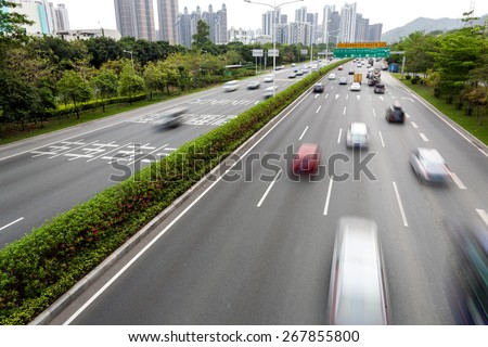 Fast blurry car on highway
