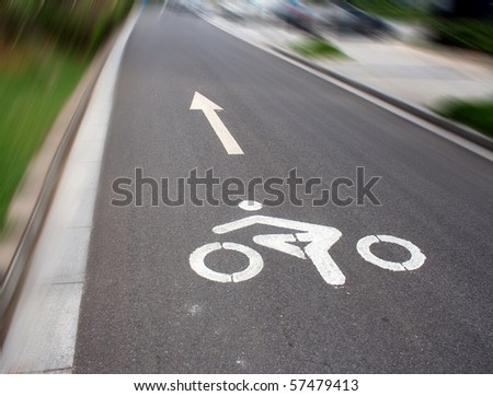 Zebra crossing and bicycle sign on the street in china.