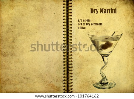 Old,vintage or grunge Spiral Recipe  Notebook with dry martini cocktail  on the page.Room for text