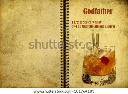 Old,vintage or grunge Spiral Recipe  Notebook with Godfather  cocktail  on the page.Room for text