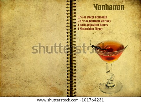 Old,vintage or grunge Spiral Recipe  Notebook with Manhattan  cocktail  on the page.Room for text